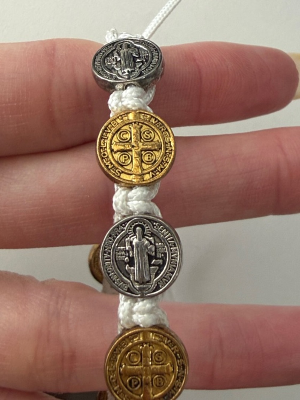 Religious Coin Bead Macrame Bracelet in Gold & Silver on White Cord